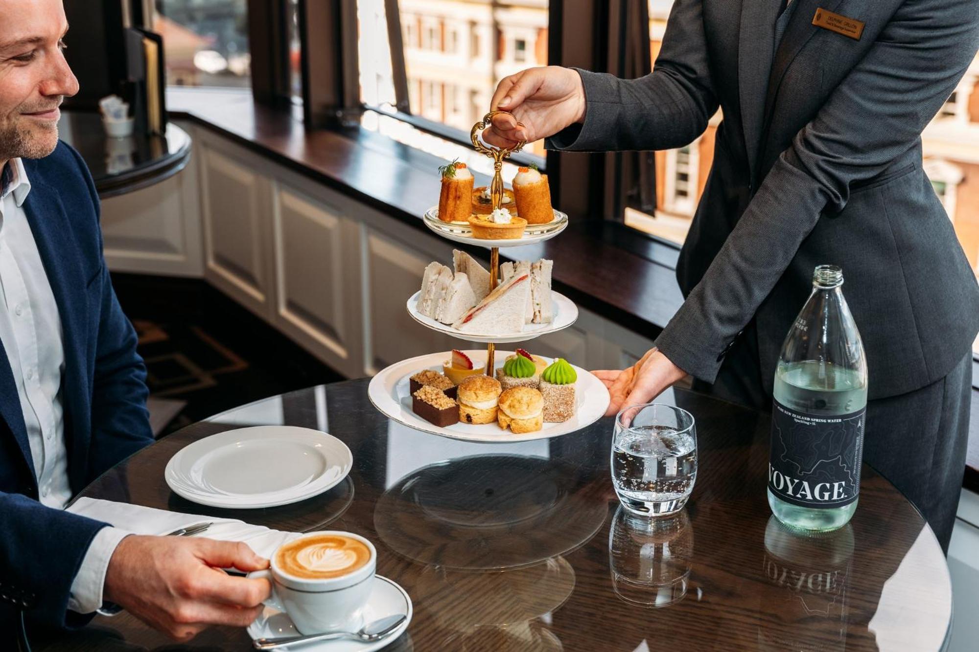Hotel Intercontinental Wellington By Ihg Exteriér fotografie A butler serving afternoon tea